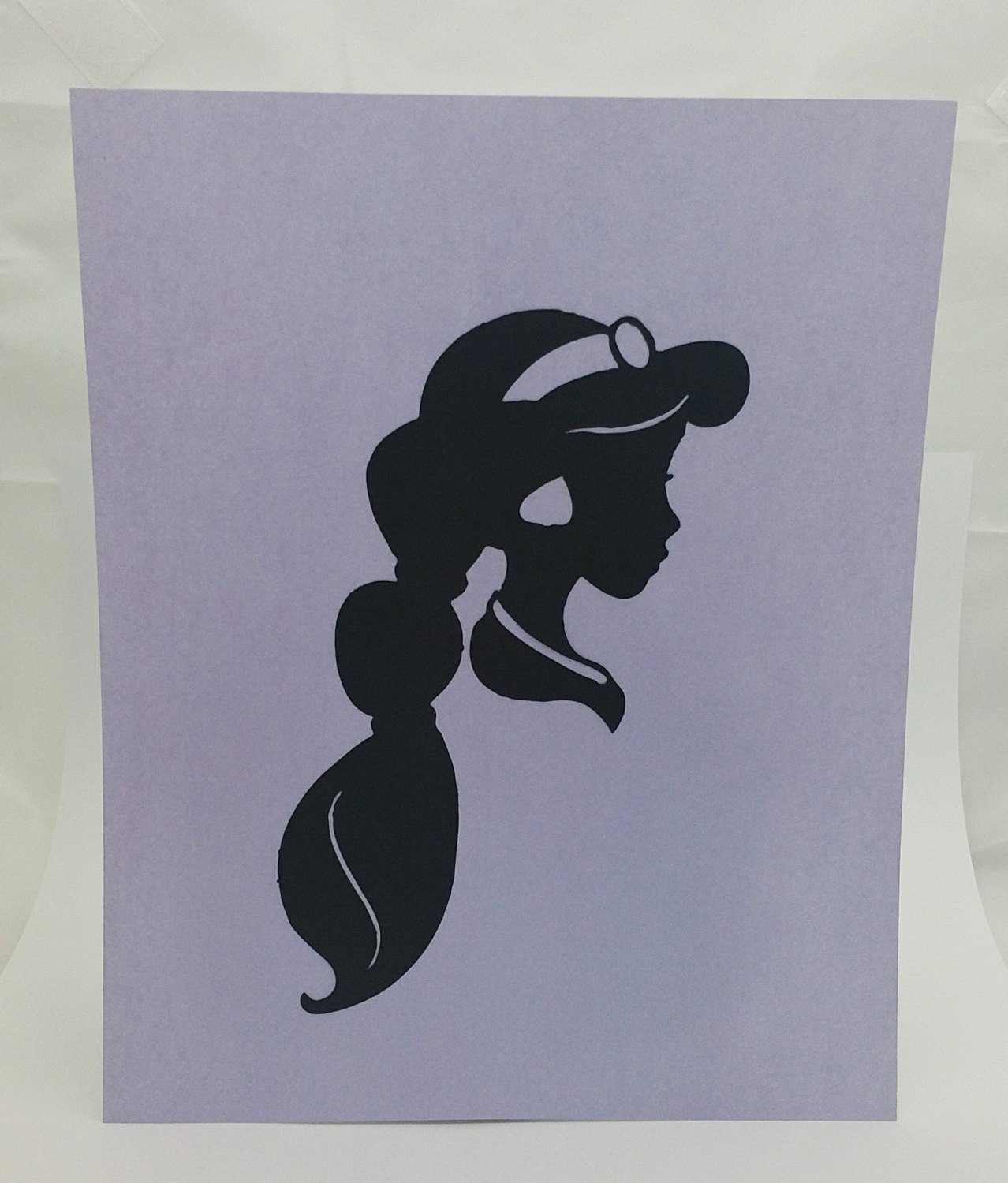 Cutting Paper With Silhouette Portrait